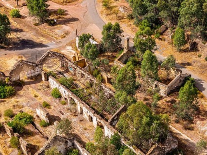 Ruins of former workshop halls, Mina de Sao Domingos, historic copper open-pit mine, aerial view,