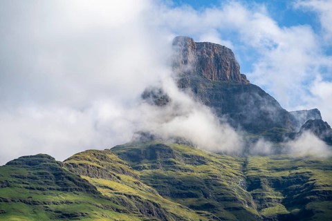 Mountains with fog at the amphitheatre, Drakensberg National Park, KwaZulu Natal, South Africa