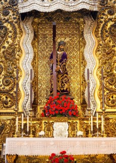 Nuestro Padre Jesus Nazareno figure on an altar in the church of San Antonio Abad, Seville, Spain