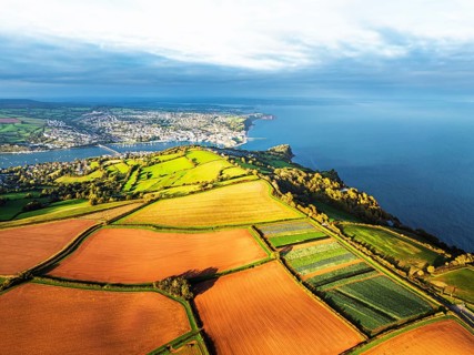 Colours of autumn Fields and Farms over Sheldon from a drone, Torbay, Devon, England, United