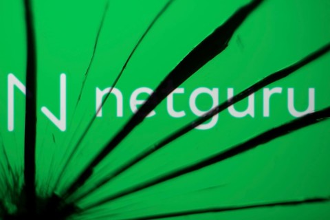Netguru logo is visible on the broekn glass. Netguru is a Polish software development company.