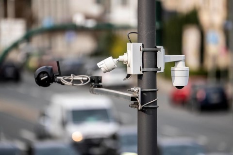 Flir and Vivotek video cameras at a large, busy traffic light intersection, Alfredstraße, B224 and