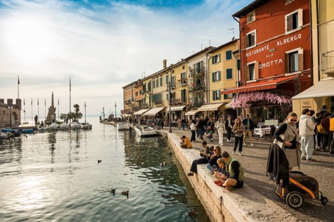 Picturesque village with colorful houses on the lake, Lazise, Lake Garda, Verona province, Veneto