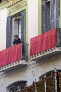 Good Friday procession, woman singing a saeta from the balcony, Malaga, Spain