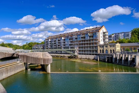 Old renovated spinning mill and dam, hydroelectric power plant on the Iller, Kempten, Oberallgäu,