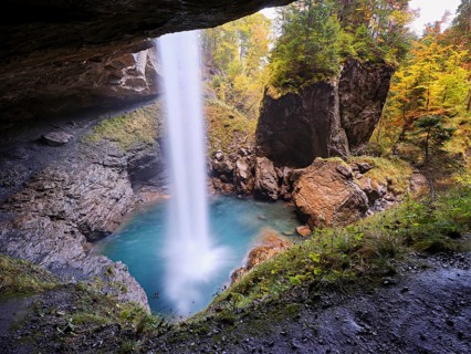 Waterfall mountain list in autumn-colored surroundings, Linthal, Klausenpass, Canton of Glarus,