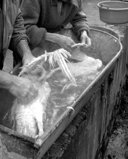 Detail, farmers digging in a brewing kettle, black and white, Franconia, Bavaria, Germany