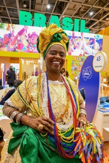 Woman in traditional dress at the Brazilian stand, International Tourism Exchange (ITB), Berlin,