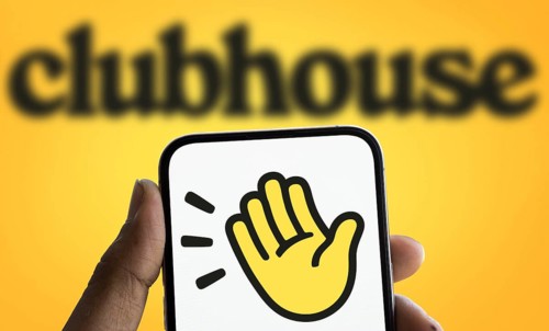 Clubhouse logo is displayed on smartphone. Clubhouse is a social audio app for iOS and Android.