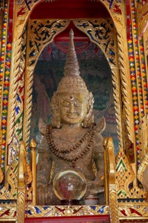 Replica of the Pha Kaeo (Emerald Buddha) in the large entrance hall, Wat Si Muang temple complex,