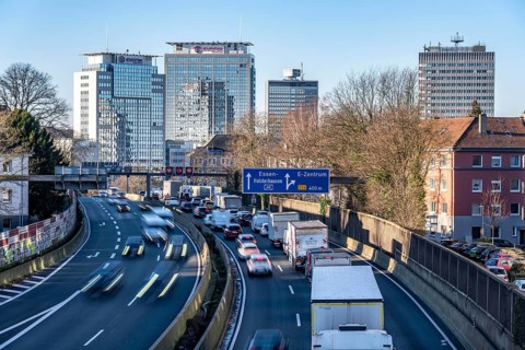 The A40 motorway, Ruhrschnellweg, in Essen, city skyline, Evonik office building, traffic jam in