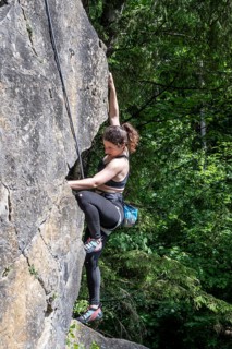 Climber rock climbing, woman climbing in toprope, sport climbing, climbing garden Bad Heilbrunn,