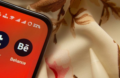 Dhaka, Bangladesh- 07 May 2025: Behance app icon is seen on smartphone