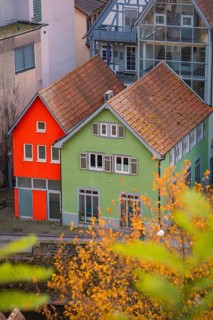 Red and green house in autumn, Calw, Black Forest, Germany