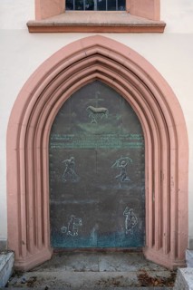 Romanesque archway, 14th century, with modern entrance door, Bürgerspitalkirche, Semmelstraße 2,
