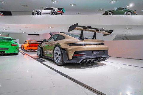 Sports car with wing spoiler in a modern exhibition with various colors, Porsche Museum, Stuttgart,