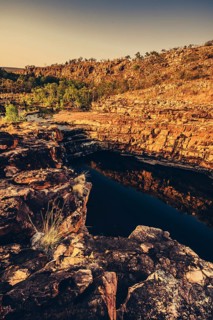Bell Gorge waterfall, a body of water in north-west Australia in the Kimberley. Sunrise in the