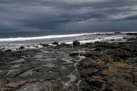 Rocky coast with volcanic stones, Playa de la Pequeña, Punta Usaje, Lanzarote, Canary Islands,