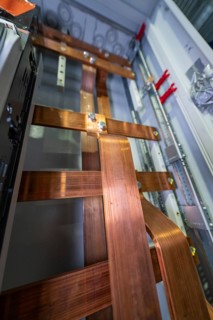 Close-up of copper connections in an electrical cabinet, switch cabinet construction, PV system