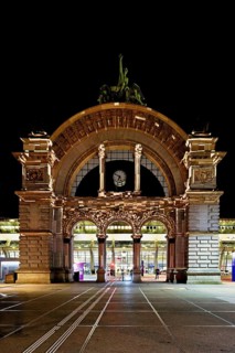Archway on the station square, light installation at dusk, Lilu, Light Festival 2023, Lucerne,