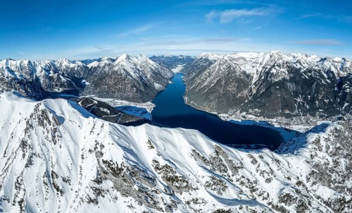 Aerial view, epic view of mountain landscape with snow in winter, summit of Bärenkopf, Achensee,