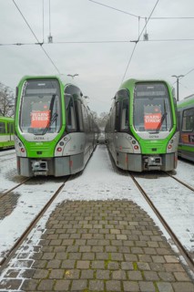 View of two TW 3000 trains of Üstra with a strike poster stuck to the windscreen, Verdi, strike,