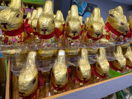 Display on shelf of retail wholesale of chocolate Easter bunnies chocolate Easter bunnies Easter