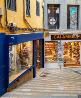 Decorative façade of small retailers in the old town of Palma de Majorca, Spain