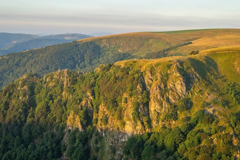 The first rays of sunshine at Mount Hohneck in the Vosges Mountains, France