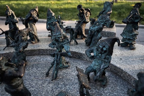 WROCLAW, POLAND - APRIL 22, 2023: Statue of dwarves representing philarmonic orchestra of Poland