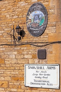 Advertising signs, Snowshill Arms pub, Snowshill, The Cotswolds, England, Great Britain