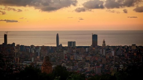 City panorama at sunset with clouds over the sea, Batumi, Georgia