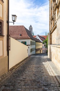 Narrow street in the Eisgrube, in the background the Upper Parish or Church of Our Lady, mountain