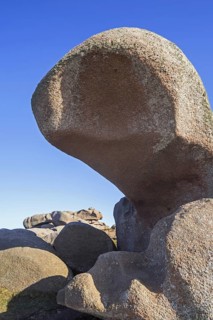 Strange rock formations and water, wind eroded boulders along the Côte de granit rose, Pink Granite
