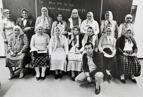 Group portrait of Turkish woman and their teacher in a literacy course, Gelsenkirchen, Germany