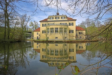 Eulenbroich Castle with reflection in the pond, Wasserschloss, Rösrath, Bergisches Land, North