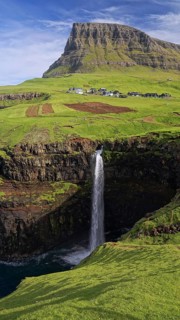 The waterfall with view of Mulafossur, Faroe Islands, Denmark, Faroe Islands, Denmark