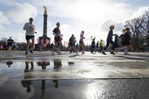 Runners run on the Big Star in front of the Victory Column at the 45th Generali Berlin Half