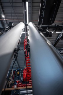 Industrial workshop with cables and lighting in a modern ambience, Waldbike Manufaktur, bicycle