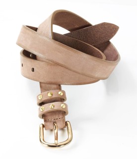 Leather belt in front of a white background, studio shot