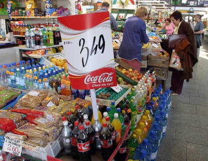 Drinks and vegetables are offered for sale in a market hall in Wroclaw, Poland, Wroclaw, Poland