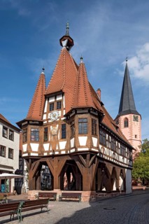 Old town hall, late medieval half-timbered building with oriels, turrets and high pointed roof,