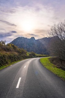 Beautiful road at sunrise in the mountains of Aiako Harria or Peñas de Aya, Guipúzcoa. Basque