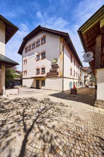 Fashion, sports and traditional costume Dollinger, fashion store, cosmetic studio, pedestrian zone,
