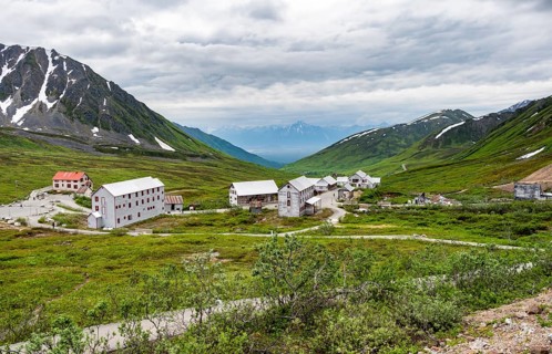 Building of the former Gold Mine Independence Mine in mountainous landscape, Independence Mine