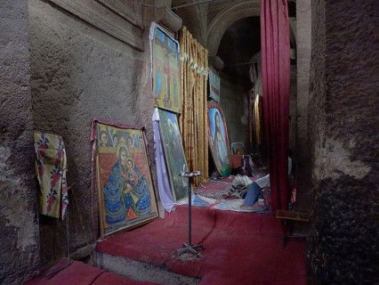 A room with religious paintings, icons and red carpets on the walls, UNESCO World Heritage Site,