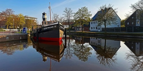 Open air shipping museum on the main canal with the museum ship Dortmund IX, Papenburg,