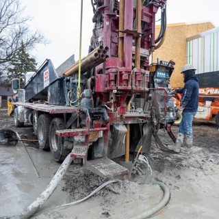 Detroit, Michigan - Workers for Crabtree Drilling drill a series of 500-foot deep wells for a