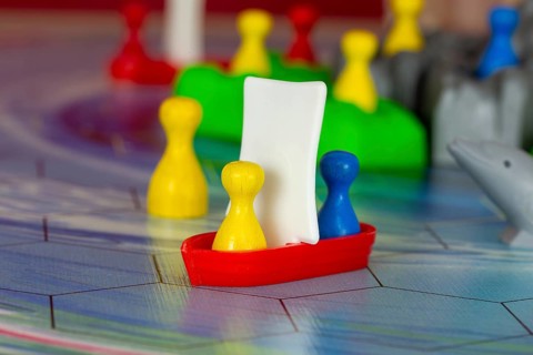 Close-up of the popular board game ATLANTIS. It falls under the category of strategy game with