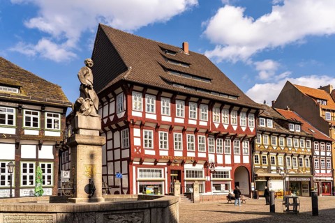 Half-timbered houses on the market square and Eulenspiegel fountain in Einbeck, district of